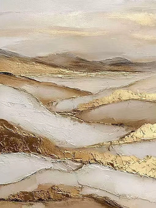 Sculpted waves of cream and sand with thick seams of gold leaf, like dunes at sunset