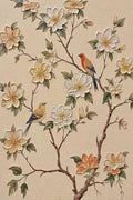 Two small birds on a branch of peach blossoms over warm beige