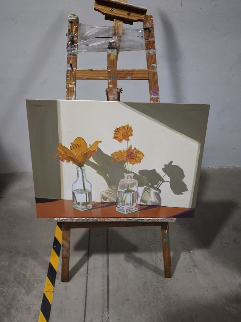 Yellow Flowers in Glass Bottles