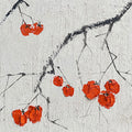 Bright red berries on dark ink branches over a rough white textured ground
