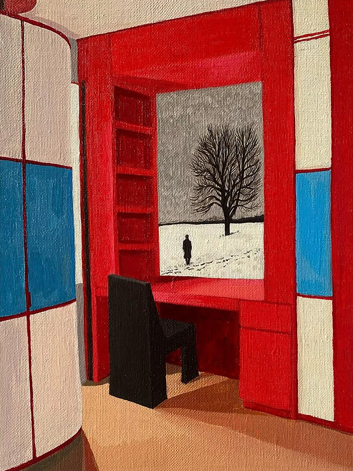 A bright red reading nook and black chair looking out on a bare tree and a lone figure in the snow