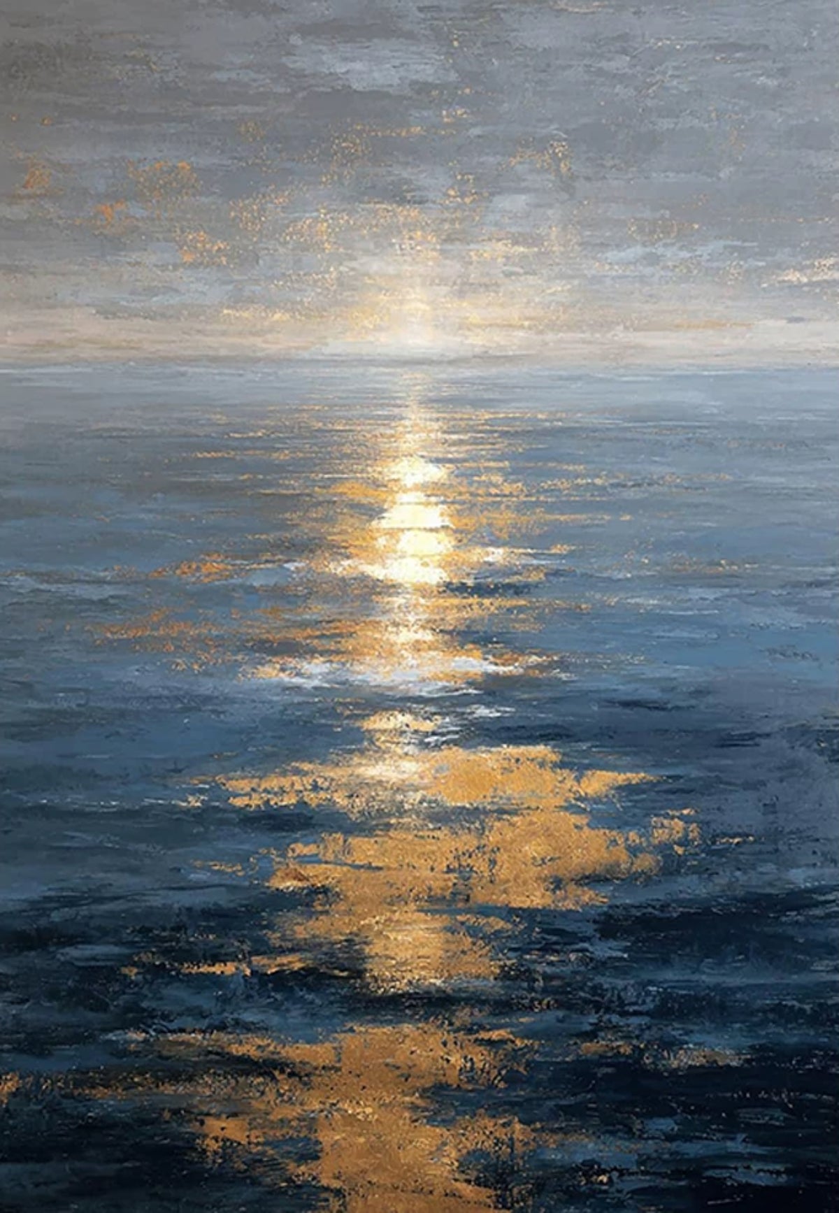 A path of silvery-gold light across dark blue water under a pale, clouded sky