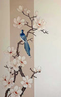 A blue bird perched among white magnolias in a soft panel of taupe and ivory