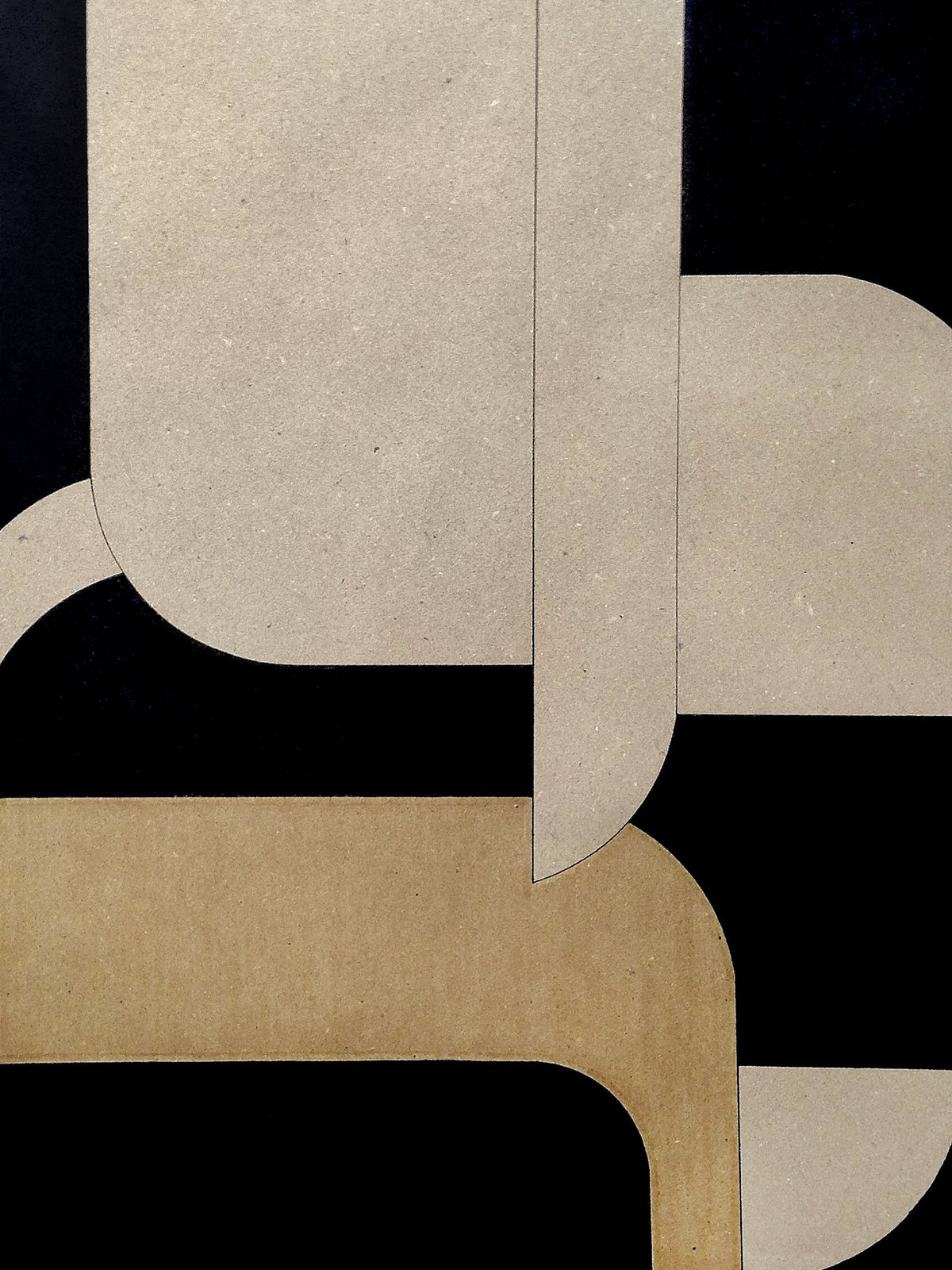 Rounded cream and gold forms linking together against a deep black ground