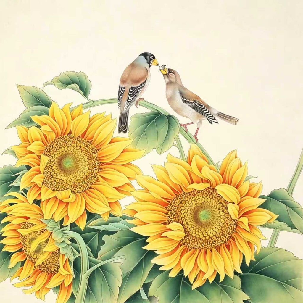 Two goldfinches sharing a seed above a cluster of bright sunflowers