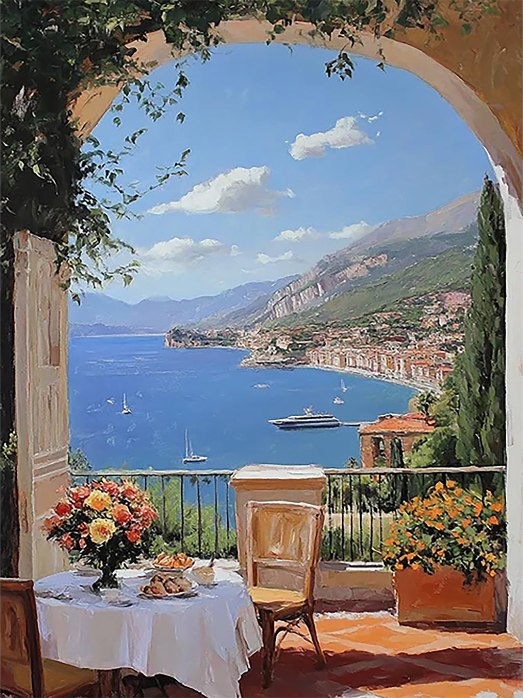 A shaded terrace table with flowers looking out over a blue bay, white villas and hills