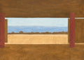 A wide window in a wooden wall framing a golden field and distant blue sea