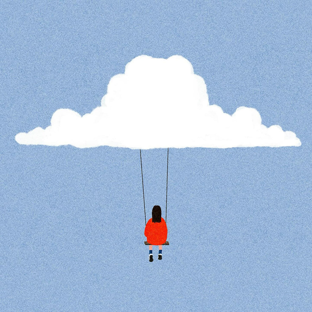 A girl in a red coat on a swing hanging from a single white cloud in a powder-blue sky