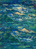 Silvery fish streaming through shimmering green and blue water flecked with gold