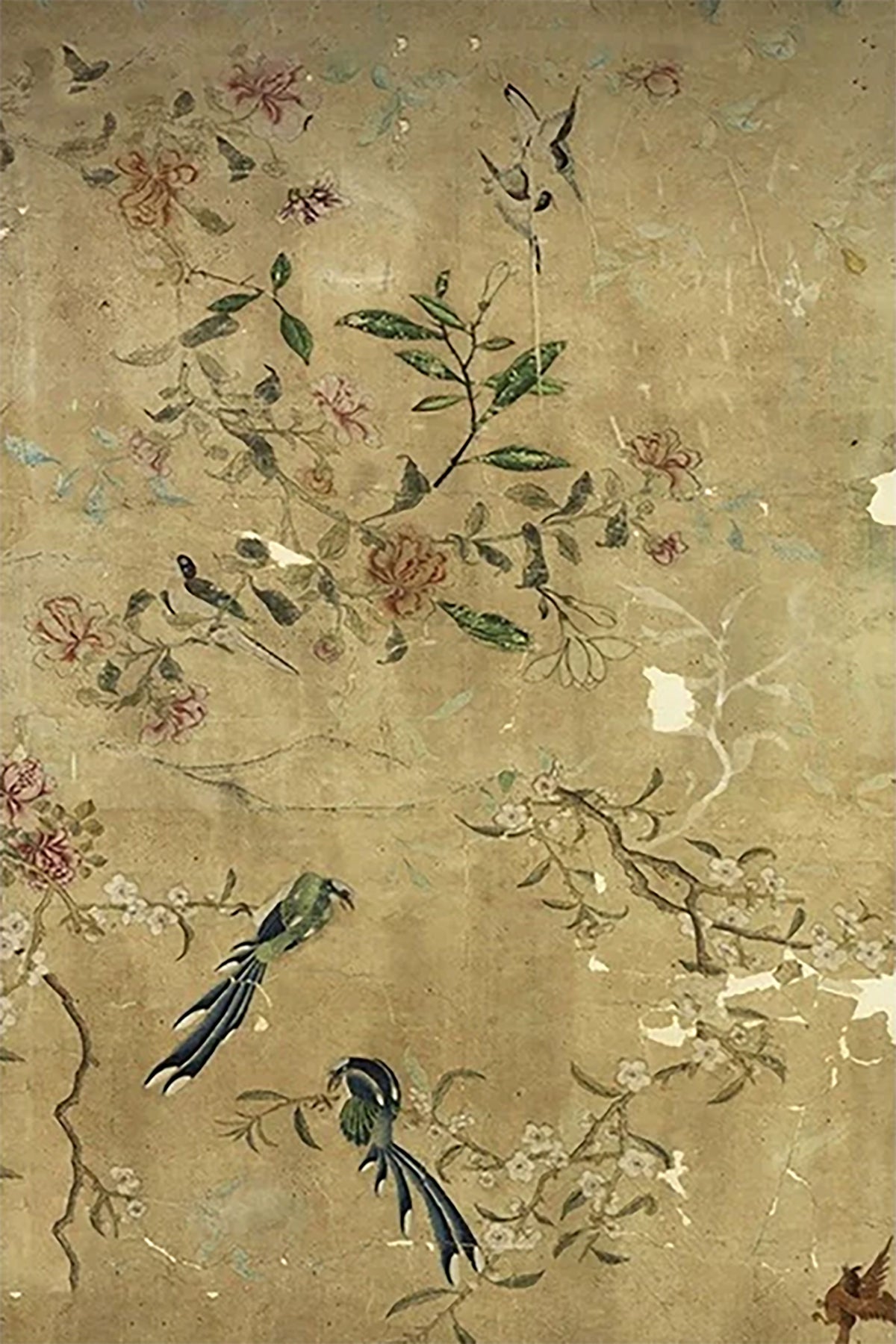 Long-tailed birds and faded blossoms on a weathered gold screen with peeling patina