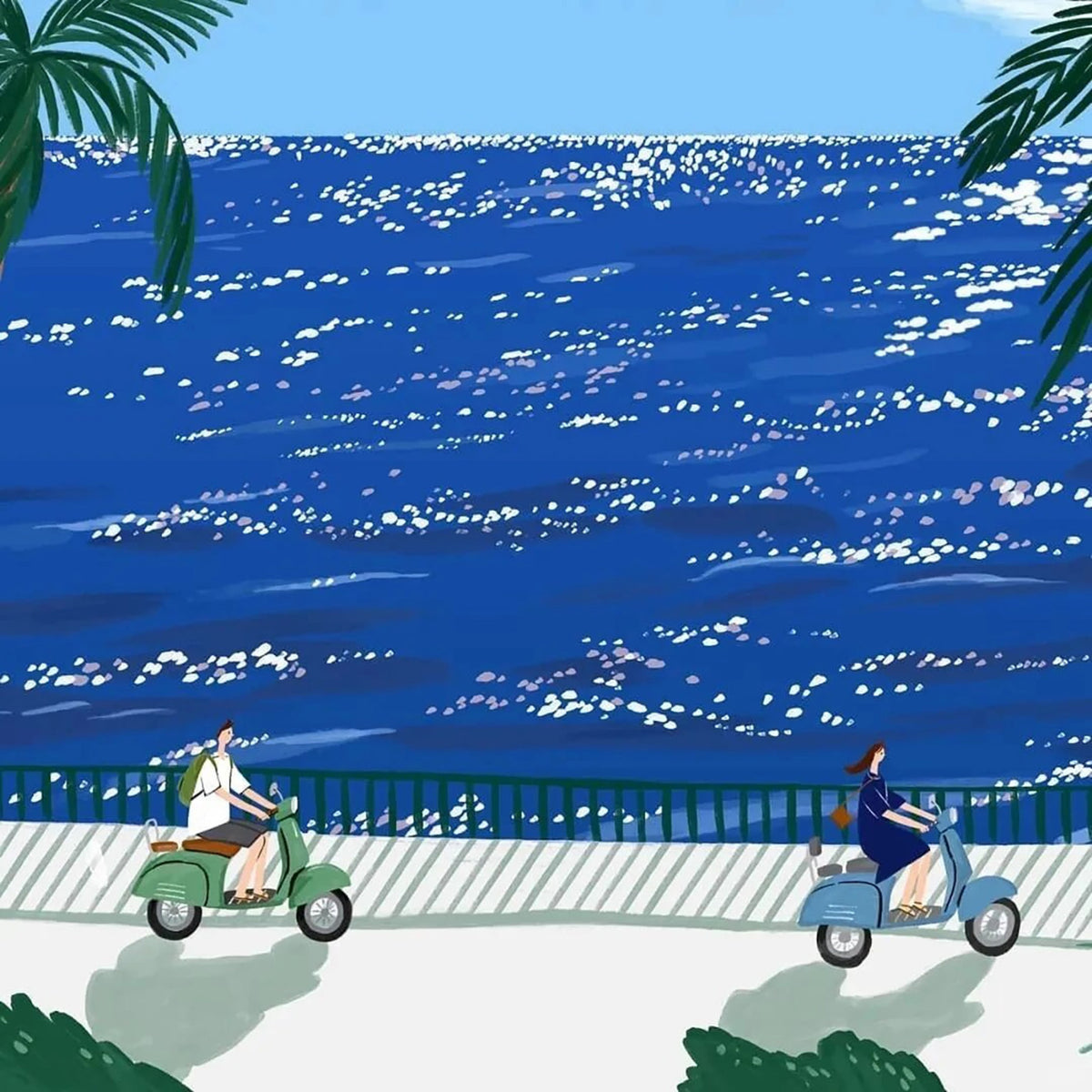 Two riders on mint and blue scooters along a seaside promenade beside a sparkling deep-blue sea