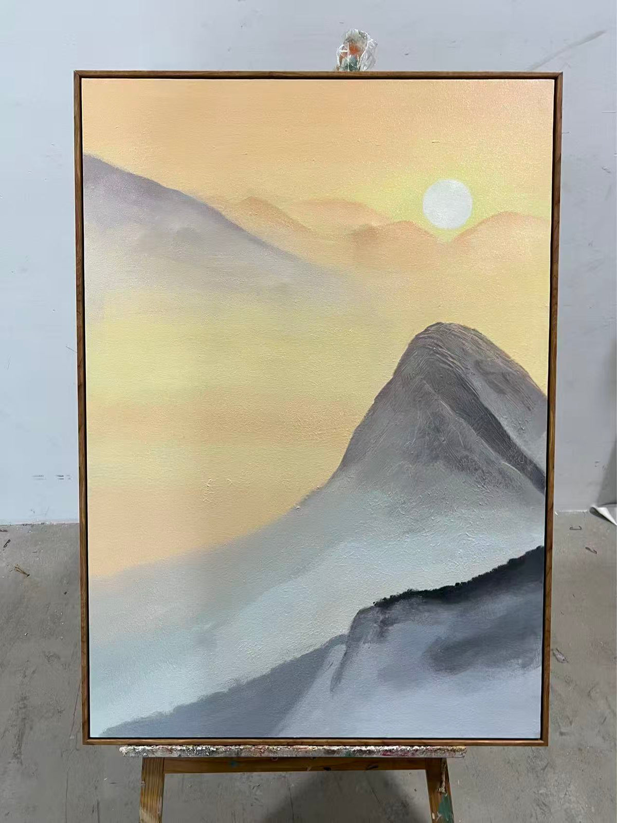 Misty Peak at Sunrise