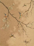 Little birds flitting around a bare blossoming branch on a speckled antique-gold ground