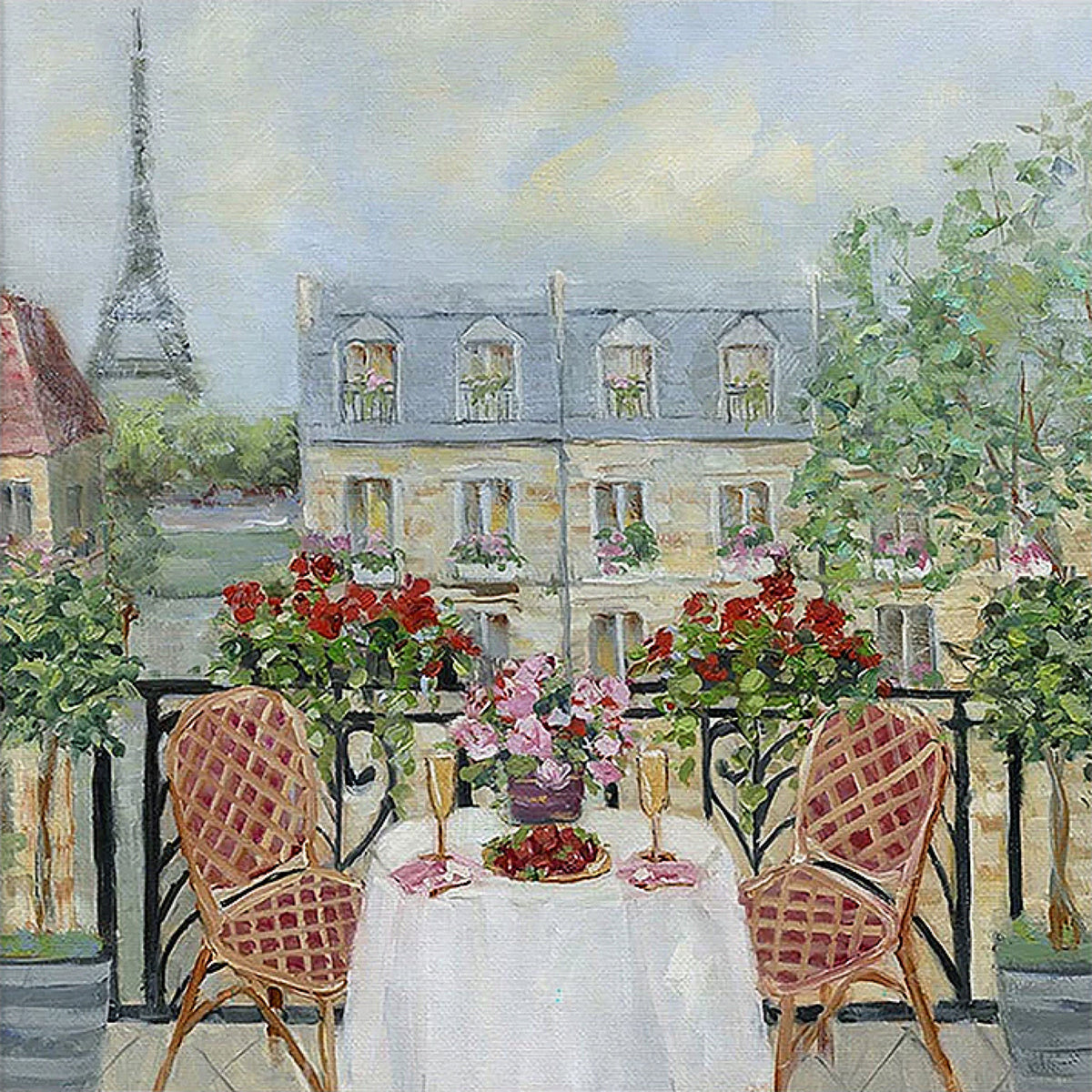 A table set with champagne and strawberries on a geranium-lined balcony, the Eiffel Tower beyond