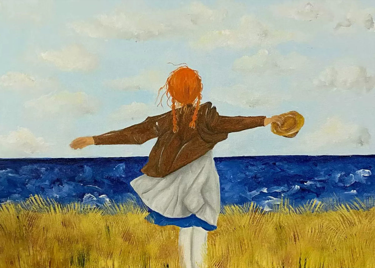 A red-haired girl in a brown jacket flinging her arms wide in a golden field above the blue sea