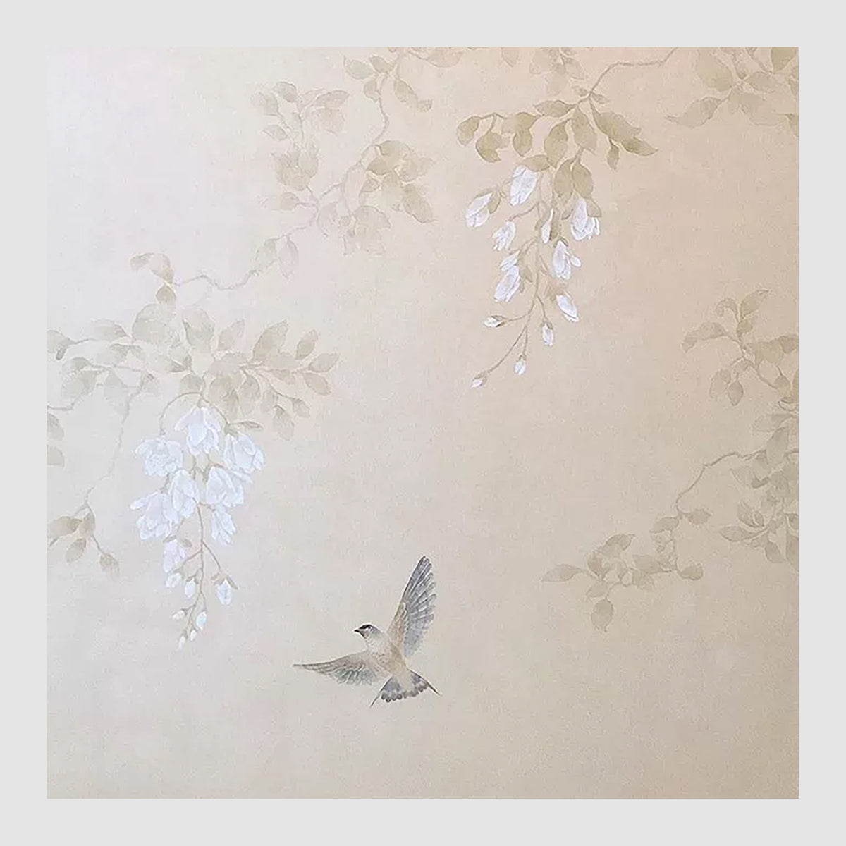 Pale wisteria and leaves drifting across a pearly champagne ground as a swallow swoops below