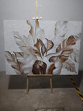 Sculpted leaves in shimmering silver and grey tones.