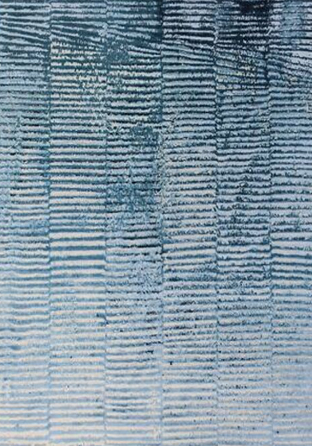 Fine horizontal tide lines in layered blues and greys.
