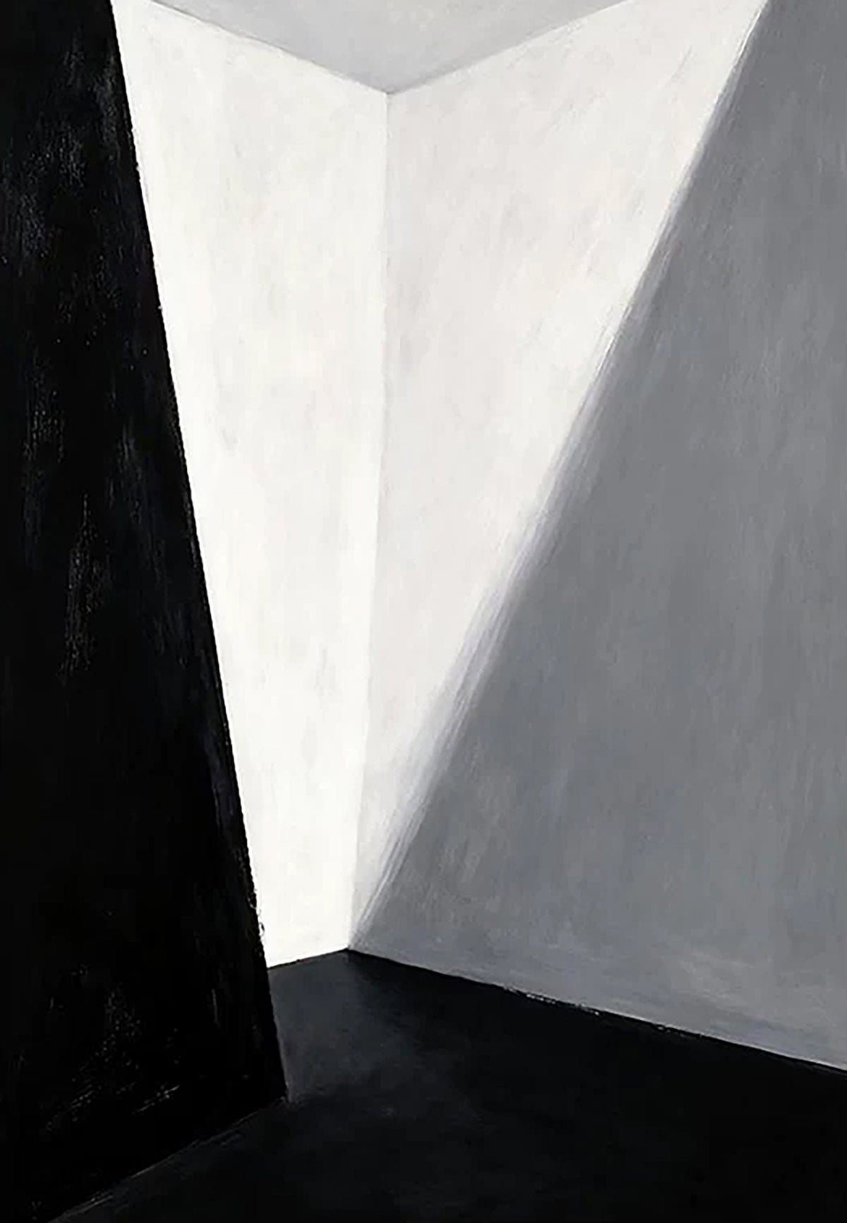 A bare corner of white walls cut by a sharp diagonal shadow