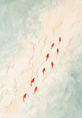 A line of small red goldfish swimming upstream through pale sea-green water