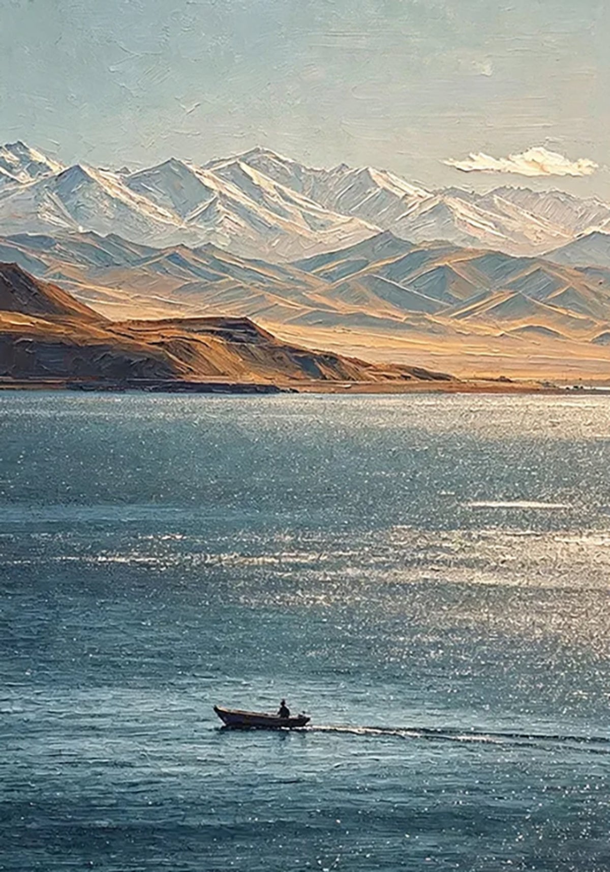 A small boat crossing a shimmering lake below snow-capped mountains and golden hills