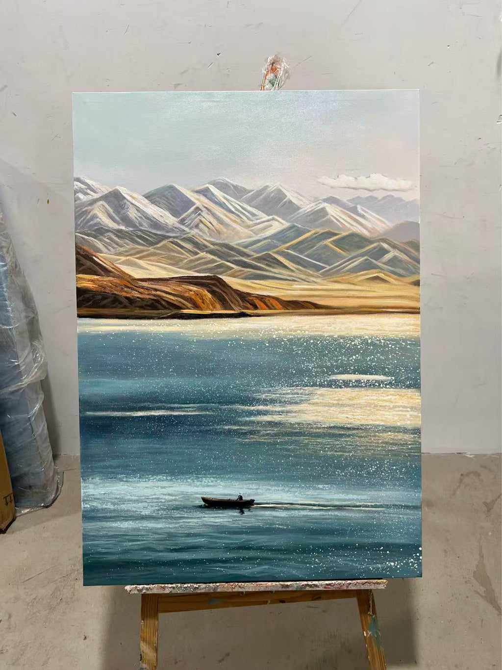 Fisherman on the Mountain Lake