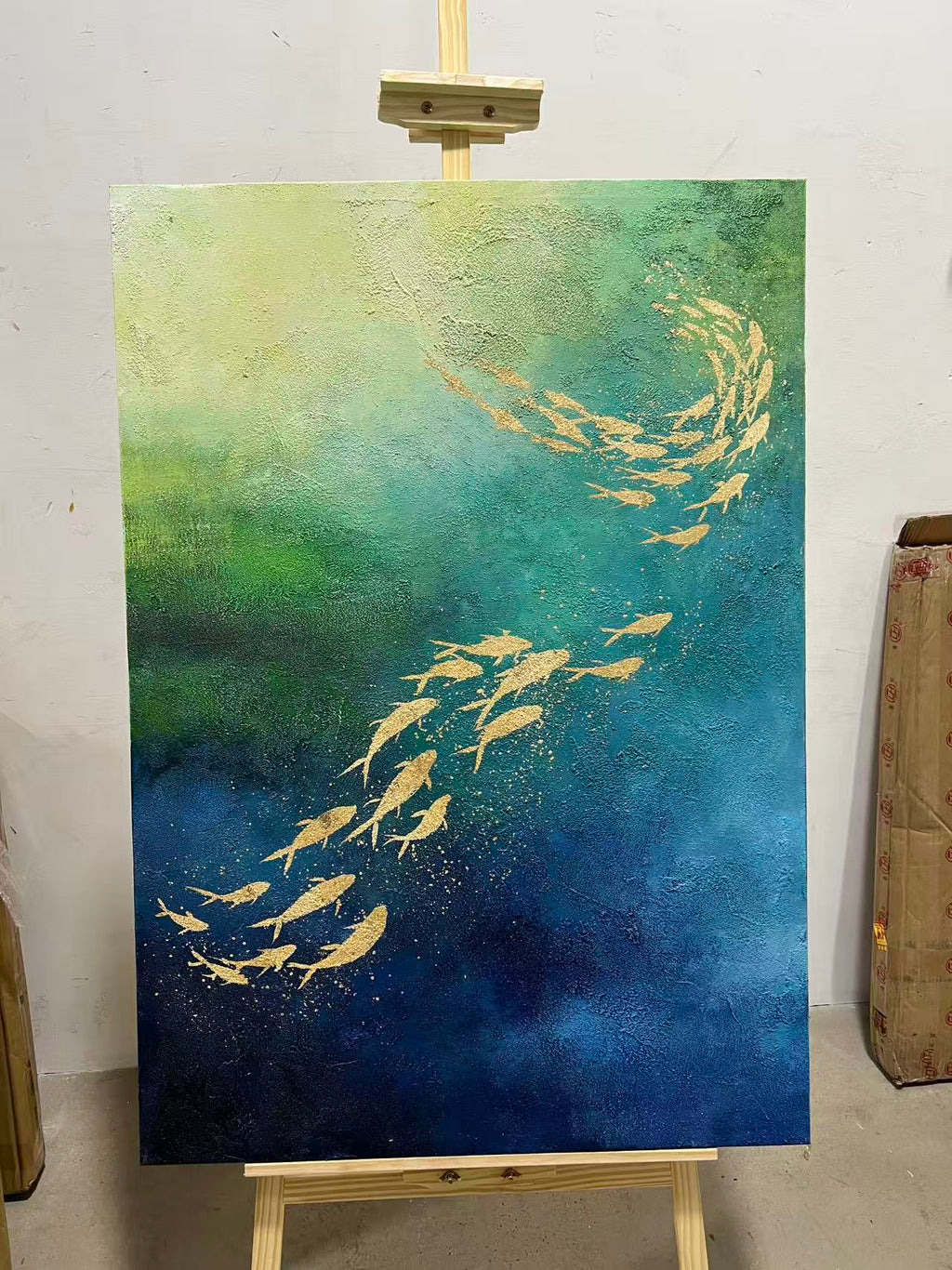 Goldfish in Teal Water