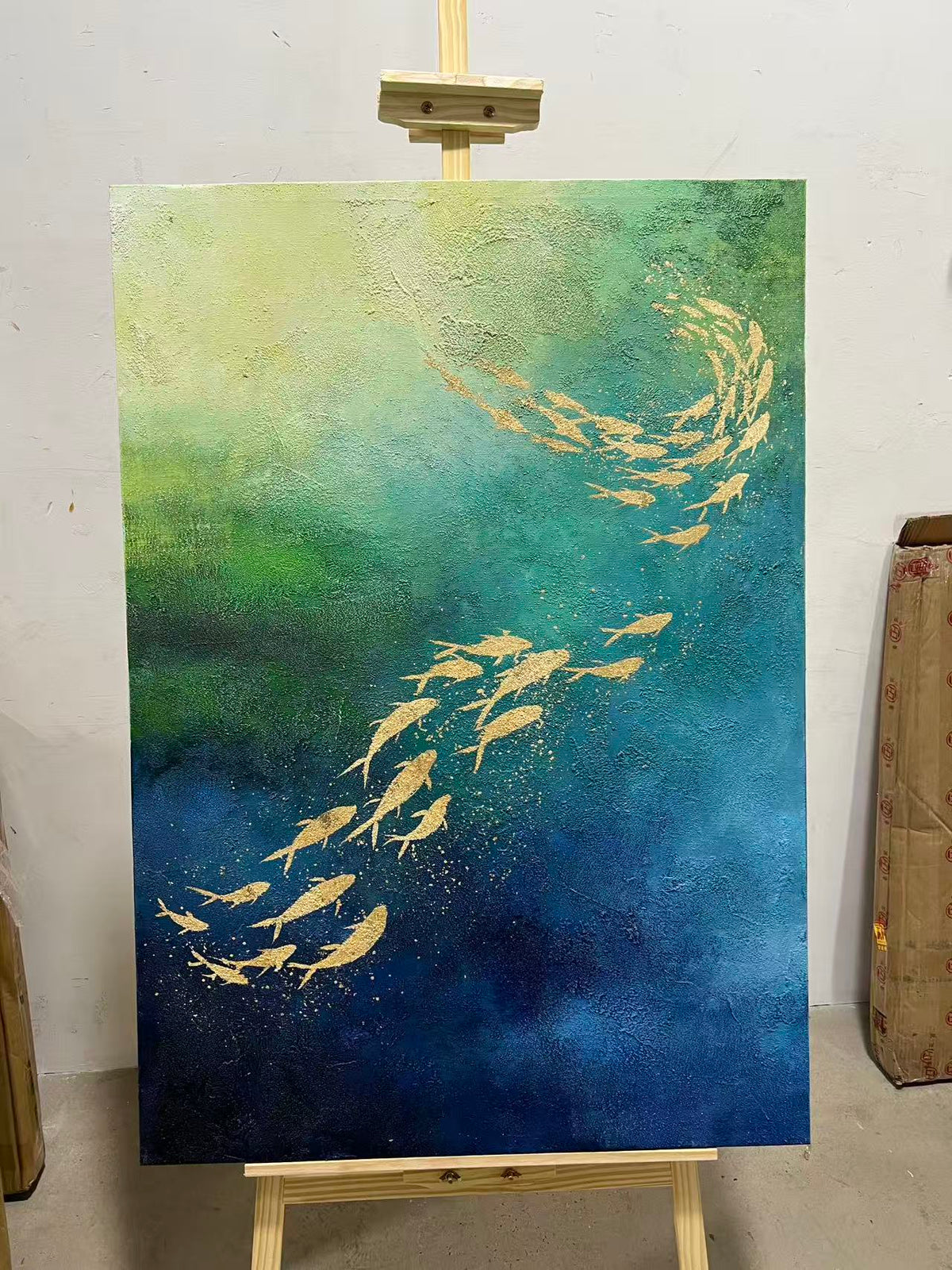 Goldfish in Teal Water