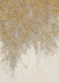 A shimmering curtain of gold flakes falling over a soft ivory ground