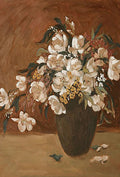 An abundant bouquet of white blossoms and yellow sprigs in a dark vase, fallen petals beside it