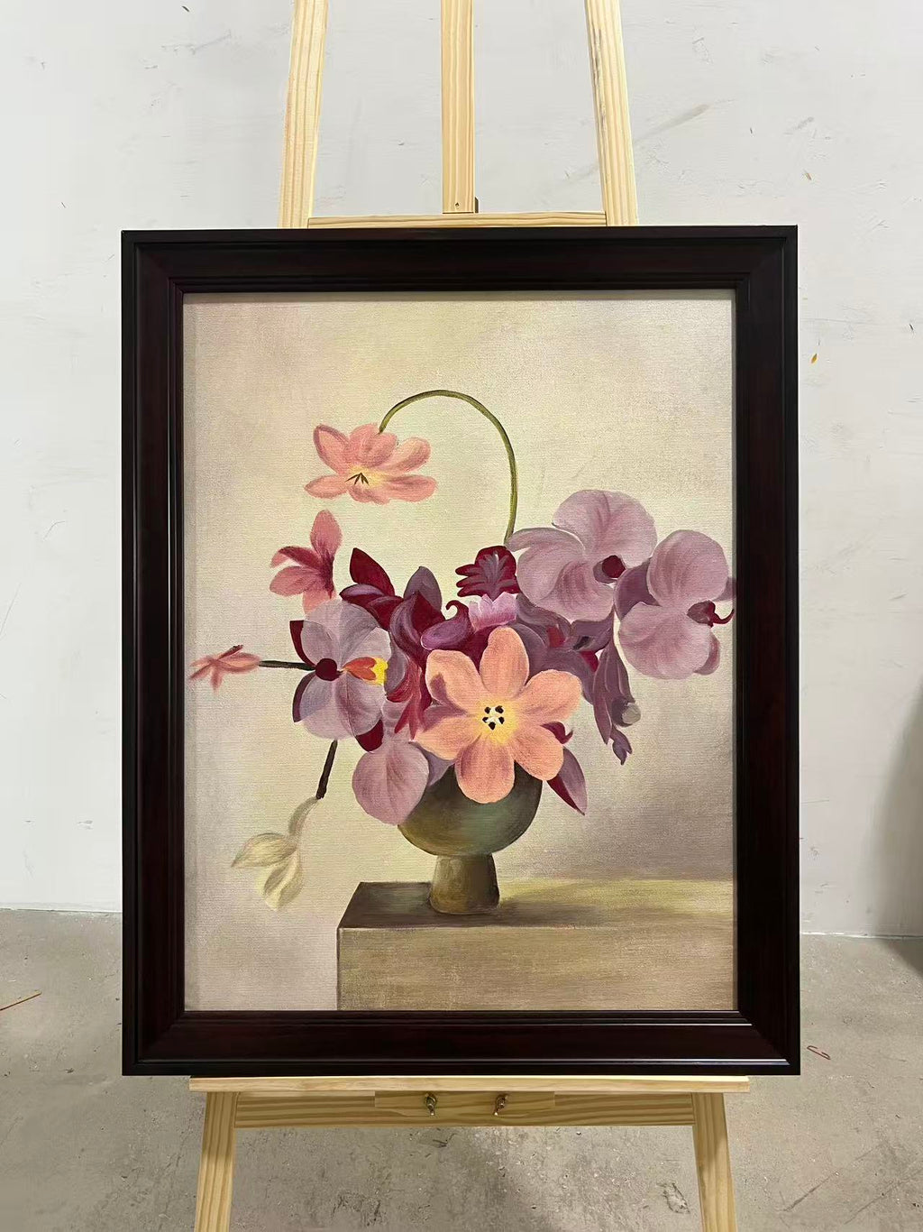Orchids in a Green Pot
