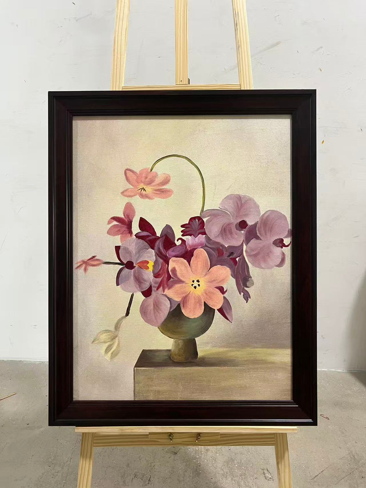 Orchids in a Green Pot
