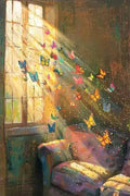 A stream of colorful butterflies flying through window light over a patchwork armchair