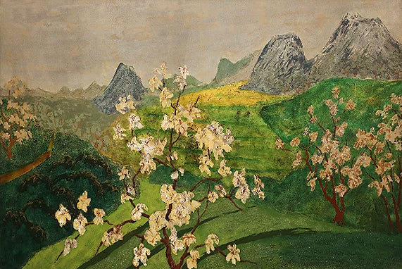 White blossoming trees on green slopes below grey mountain peaks