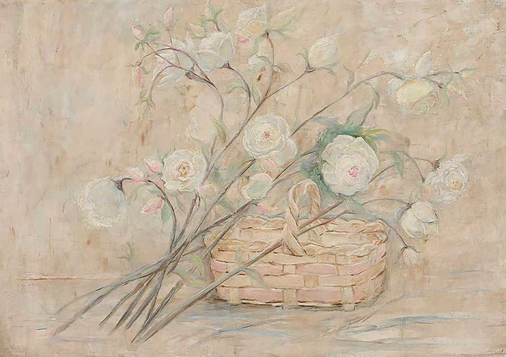 Long-stemmed white roses laid across a wicker basket in soft, faded tones
