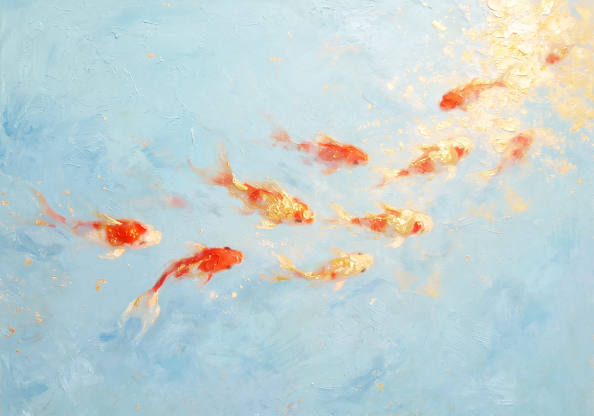 A loose shoal of orange goldfish in a pale blue wash